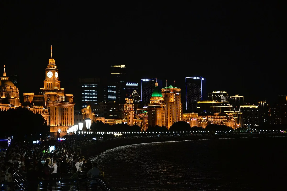 The Bund’s historic waterfront illuminated at night.