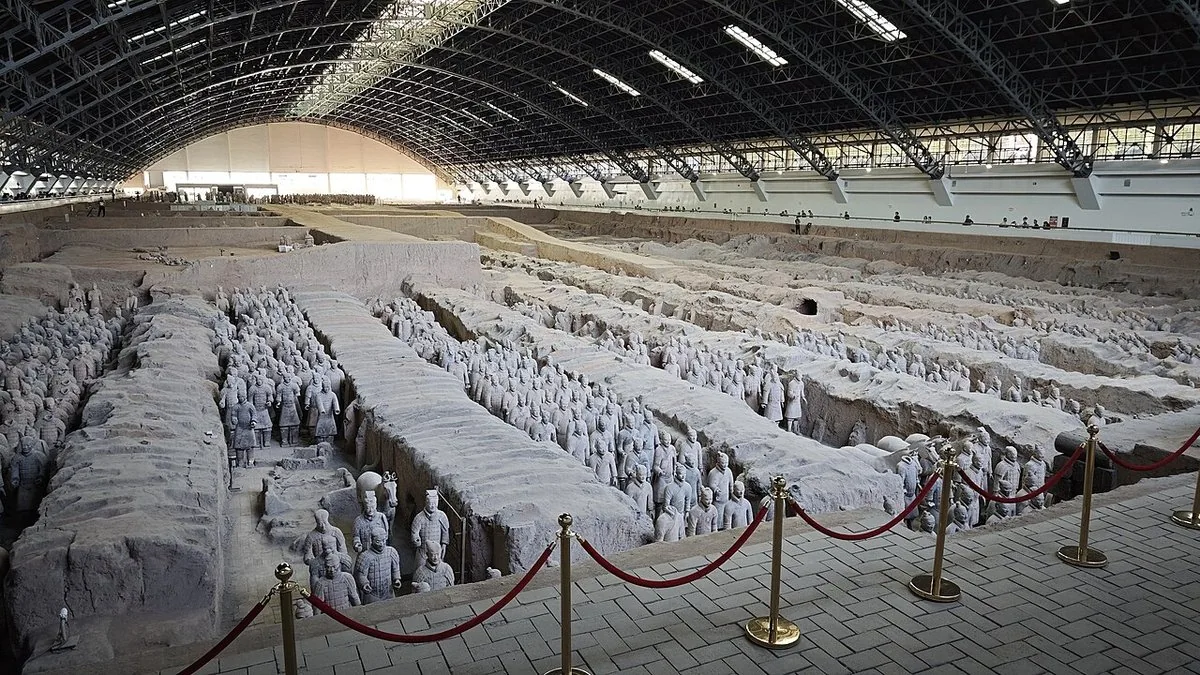 Rows of terracotta figures beneath the roof of Pit 1.