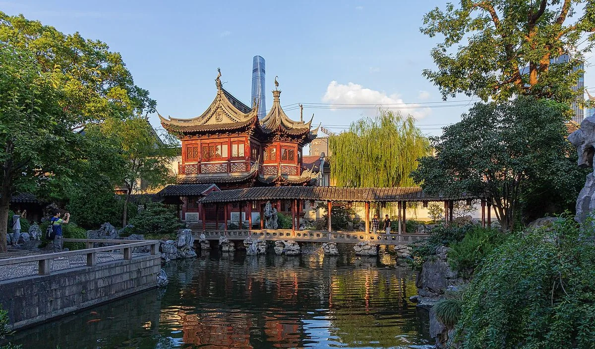 Tingtao Tower and its reflection in a pond at Yu Garden.
