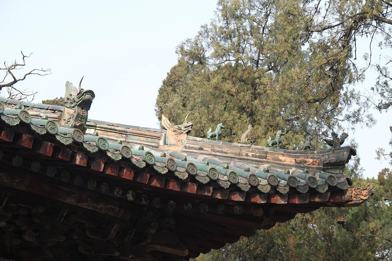 Glazed roof tiles and decorative figures at Qufu’s Temple of Confucius.