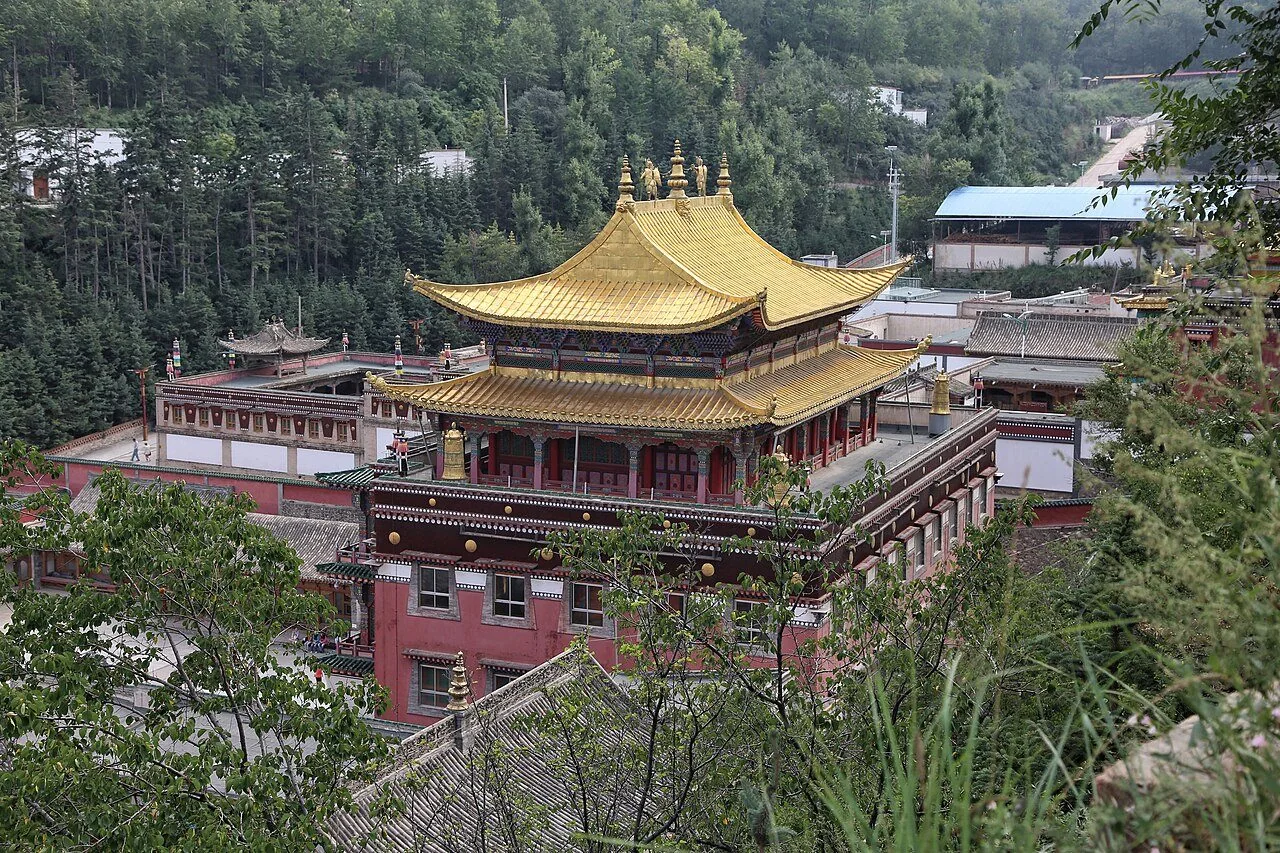 A golden-roofed temple building at Kumbum Monastery.